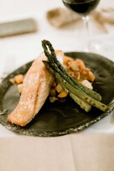 salmon, potatoes and asparagus on a plate